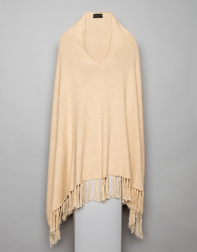 Beige cape with fringe