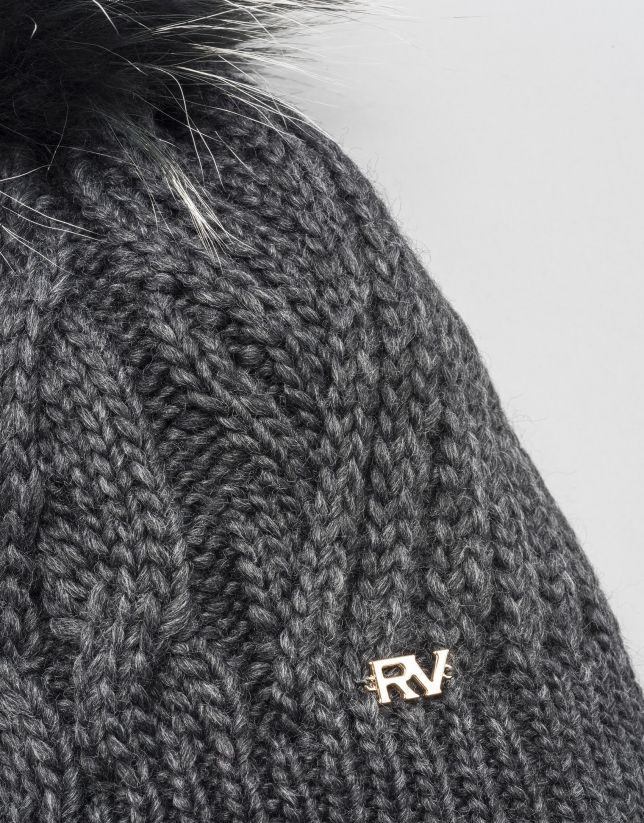 Grey cable knit wool cap with pompom