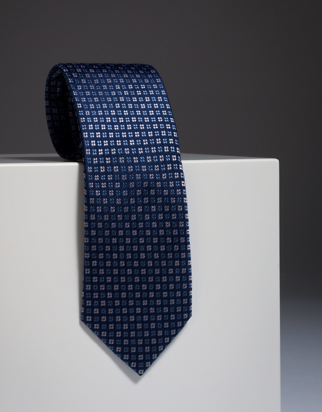 Navy blue silk tie with light blue / ivory flowers