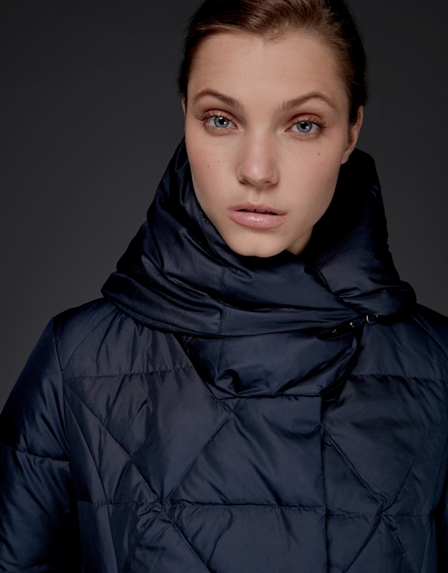 Long navy blue quilted ski jacket