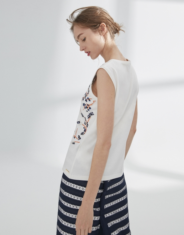 White top with flower embroidery