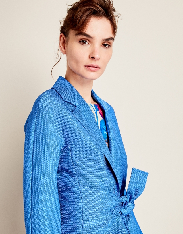 Blue jacket with bow