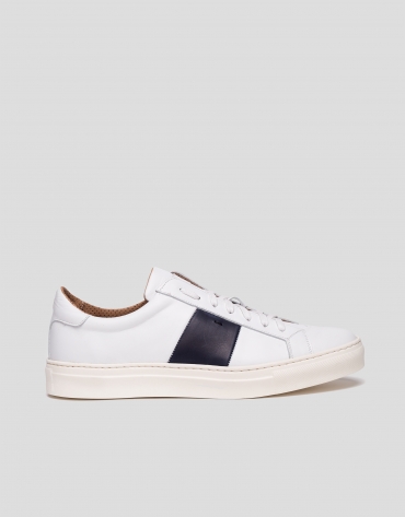 White sports shoes with side panels
