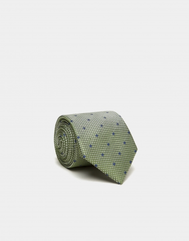 Green silk tie with blue jacquard dots
