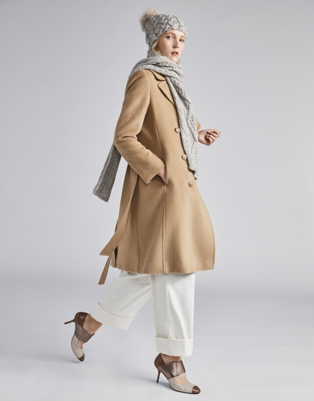 Beige cloth coat with triple row of  buttons