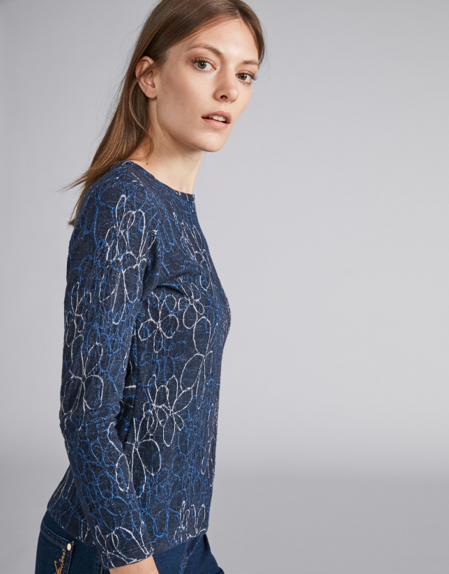 Navy blue knit top with floral print