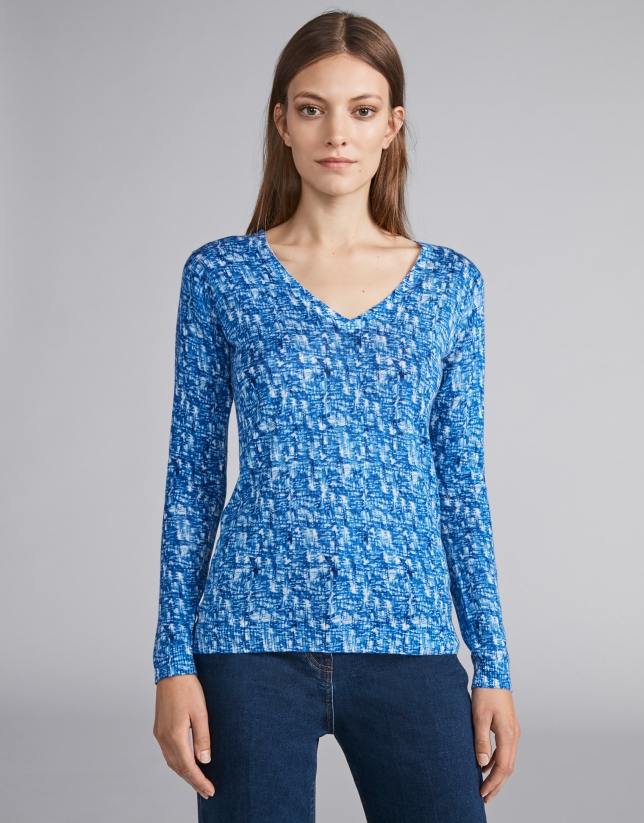 Blue knit top with decoration