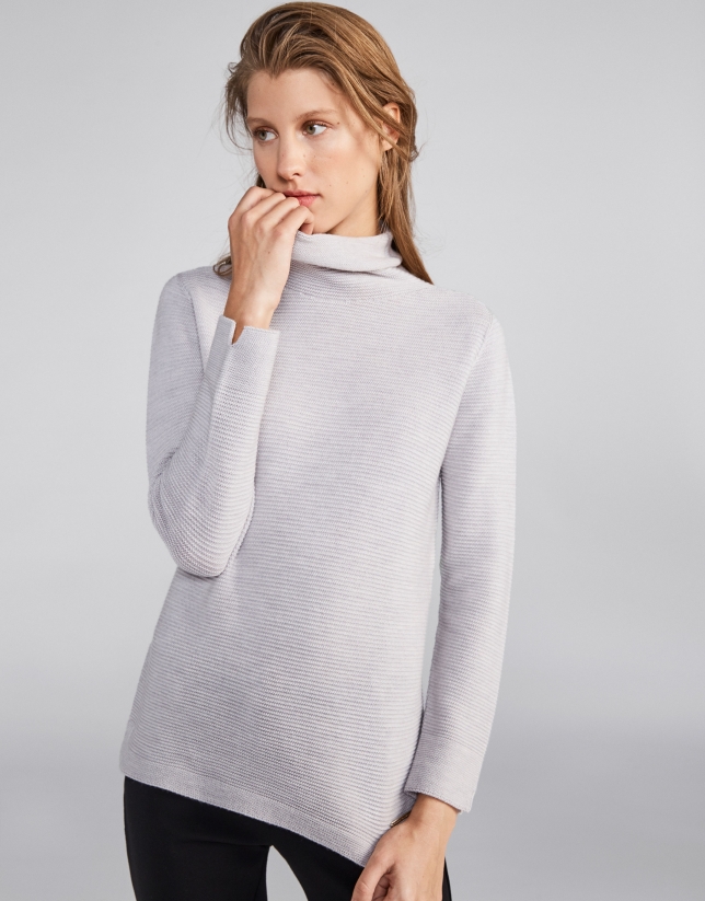 Silver sweater with design and slits on sleeves