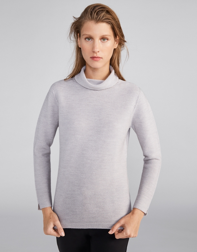 Silver sweater with design and slits on sleeves
