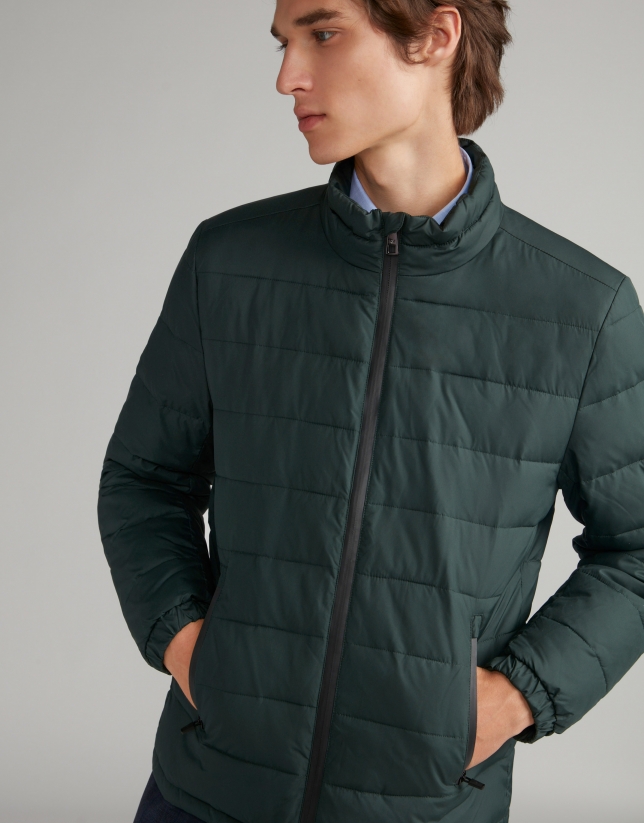 Khaki tech ski jacket with details on zippers