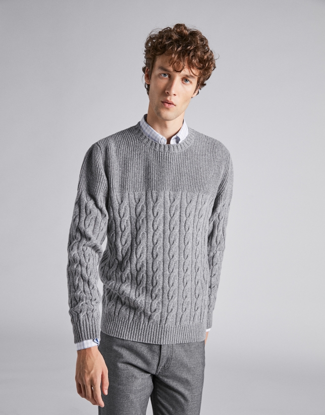 Gray sweater with cable-stitching