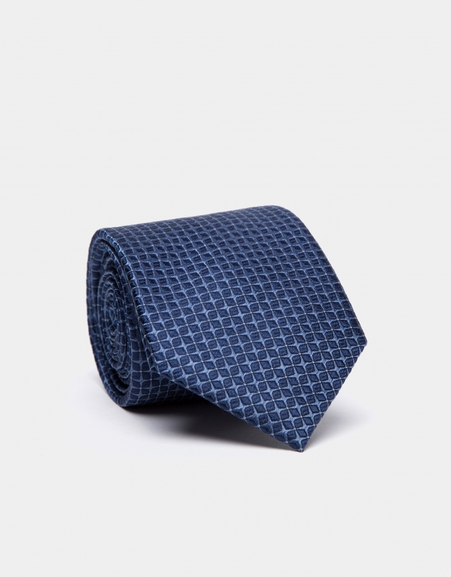 Silk tie with blue jacquard structure 