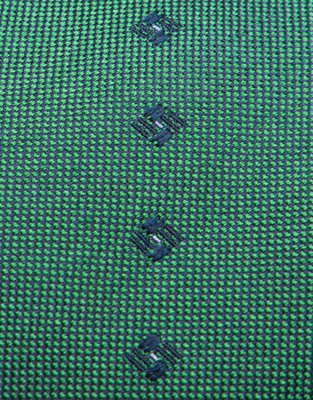 Green silk tie with navy blue geometric jacquard print