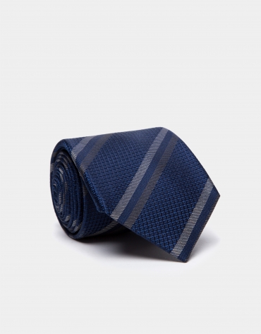 Navy blue silk tie with beige/dark mink-colored stripes