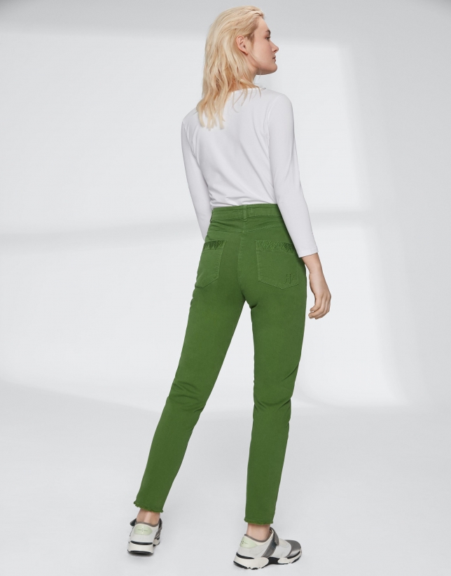 Green pants with fringe hem