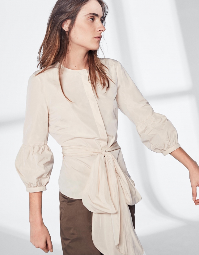 Sandy-colored top with gathered sleeves
