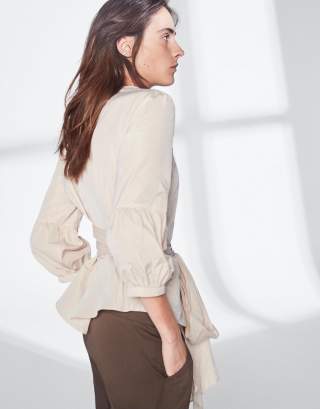 Sandy-colored top with gathered sleeves