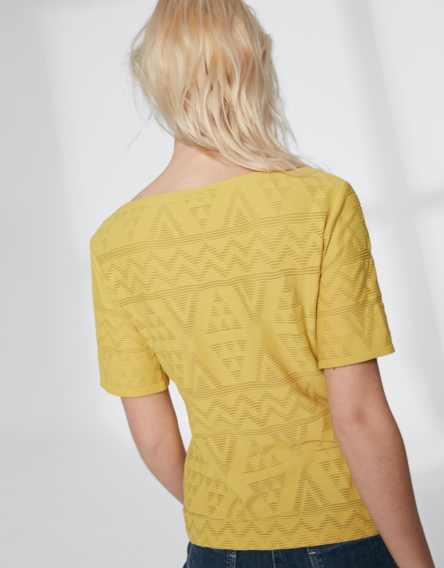 Yellow top with an embossed fabric