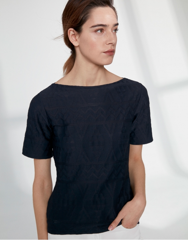 Navy blue top with an embossed fabric