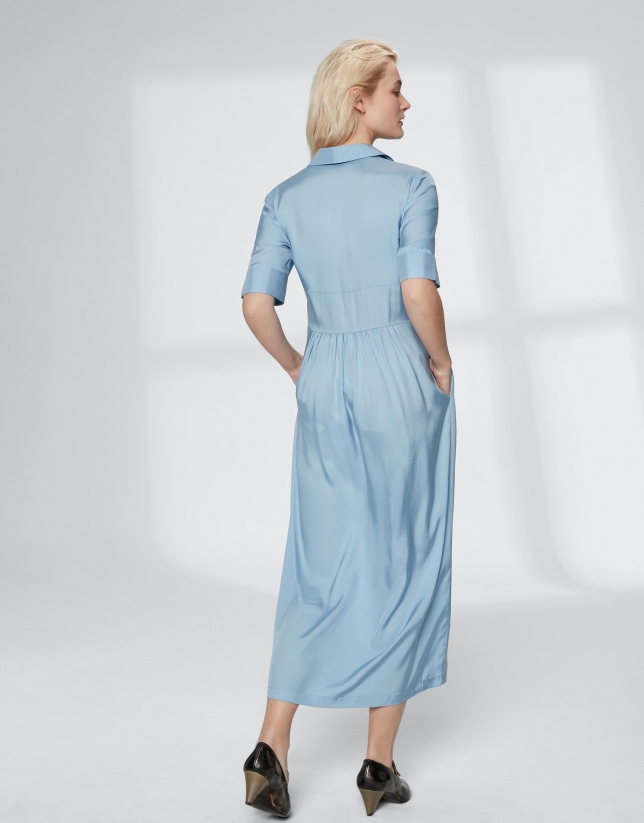 Long blue flowing shirtwaist dress