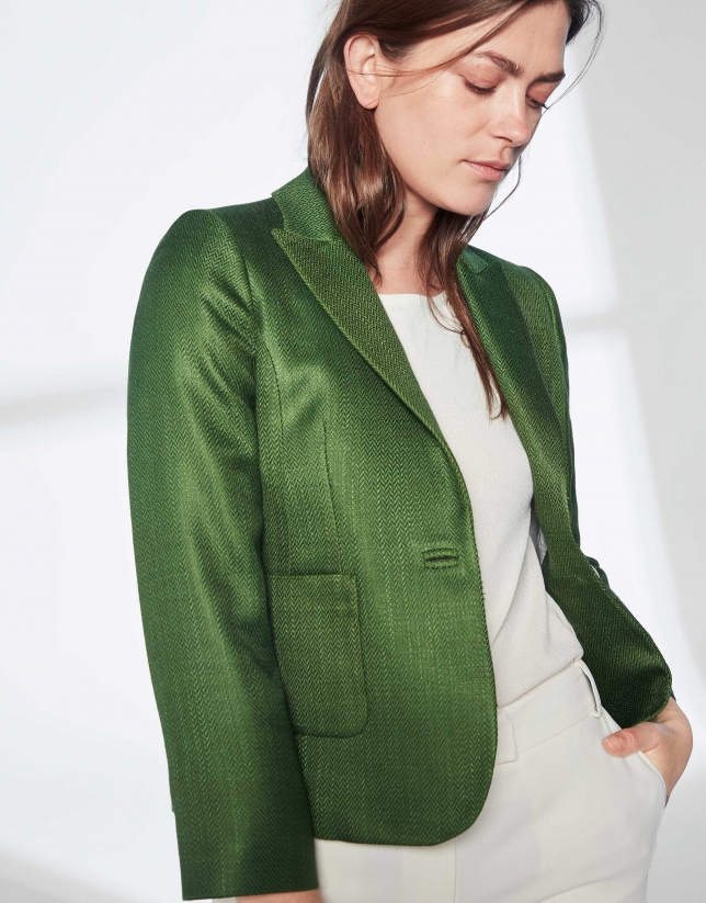 Dark green suit jacket with one button
