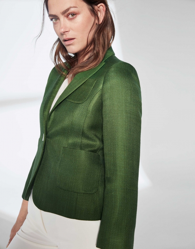 Dark green suit jacket with one button