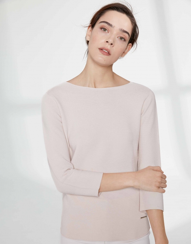Sandy-colored sweater with round neckline