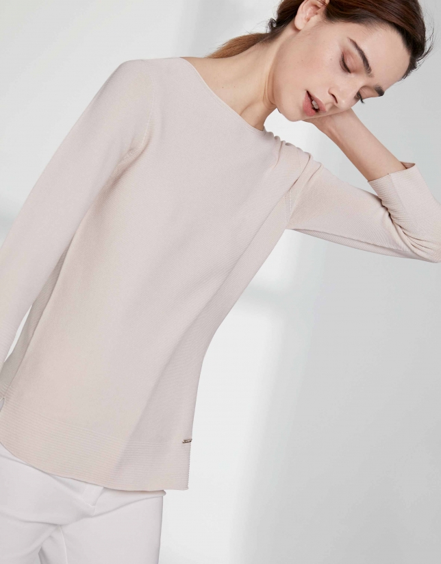 Sandy-colored sweater with round neckline