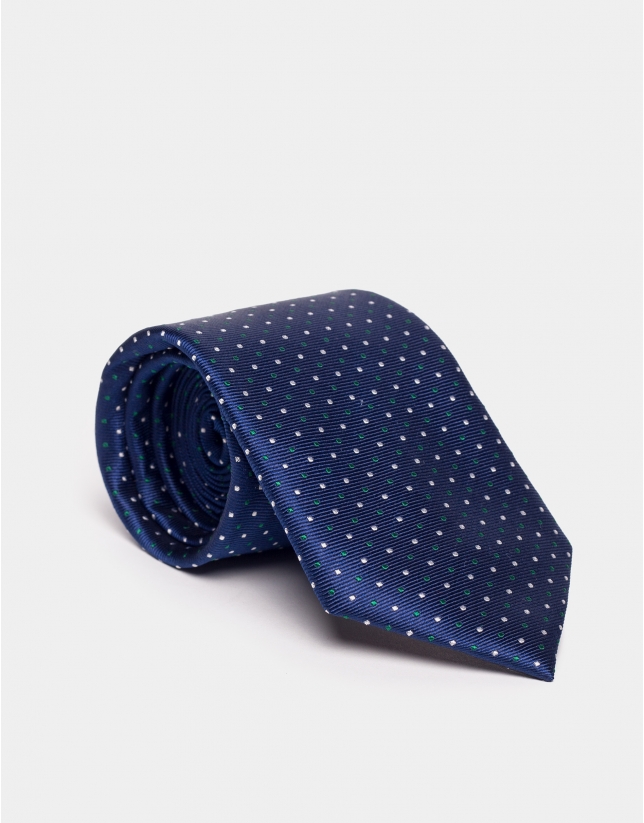 Blue silk jacquard tie with dots. 