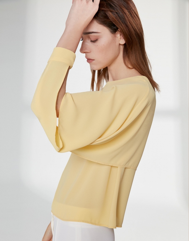 Yellow top with superimposed cape