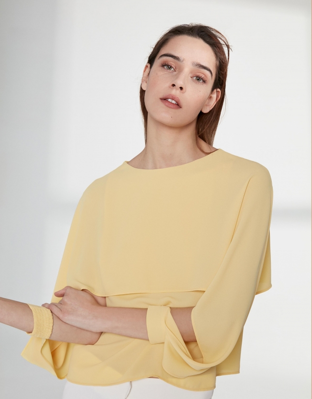 Yellow top with superimposed cape