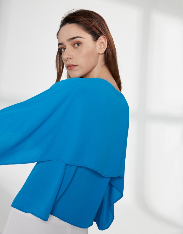 Blue top with superimposed cape