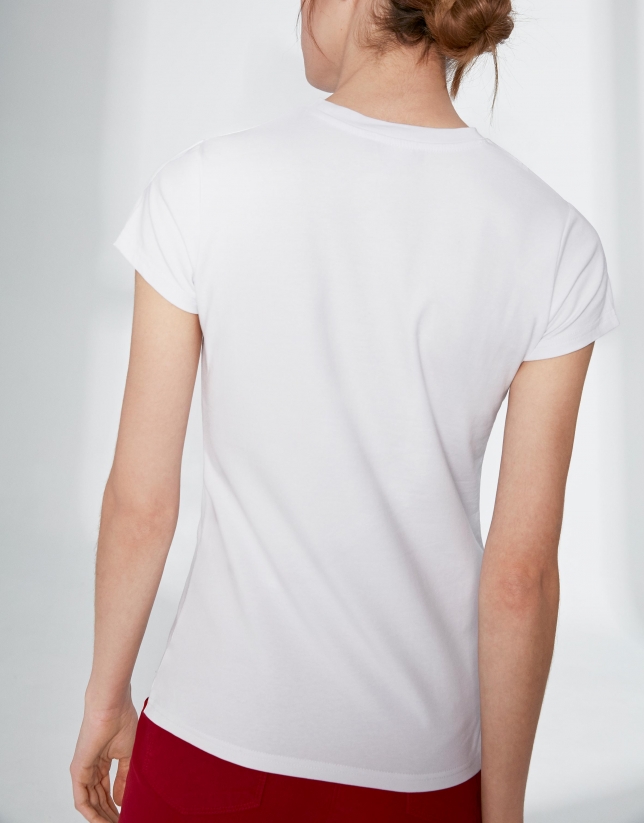 White top with Verino logo and fringe