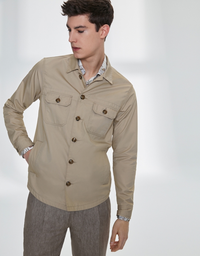 Sandy-colored windbreaker with pockets