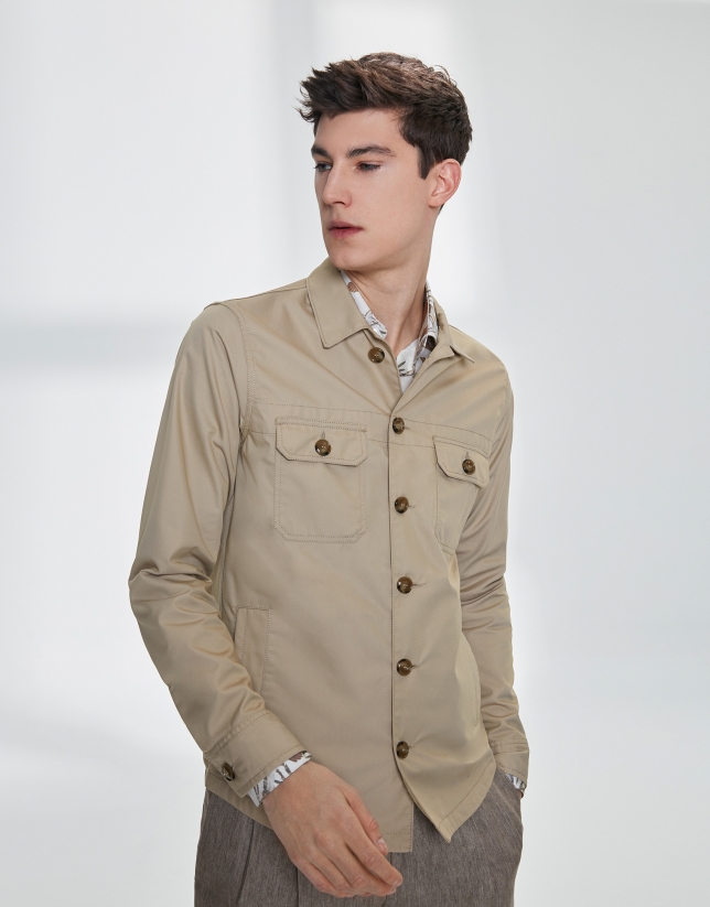 Sandy-colored windbreaker with pockets
