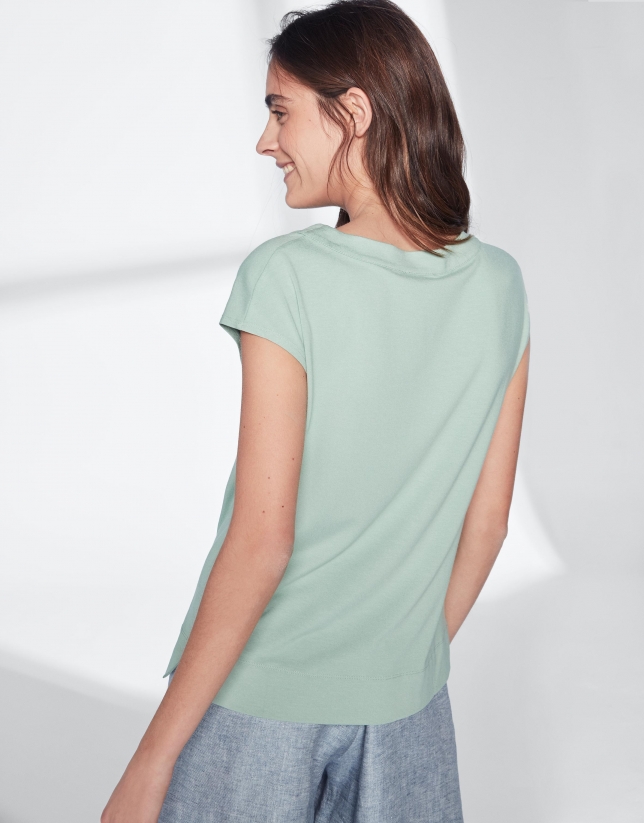 Green pastel top with V-neck