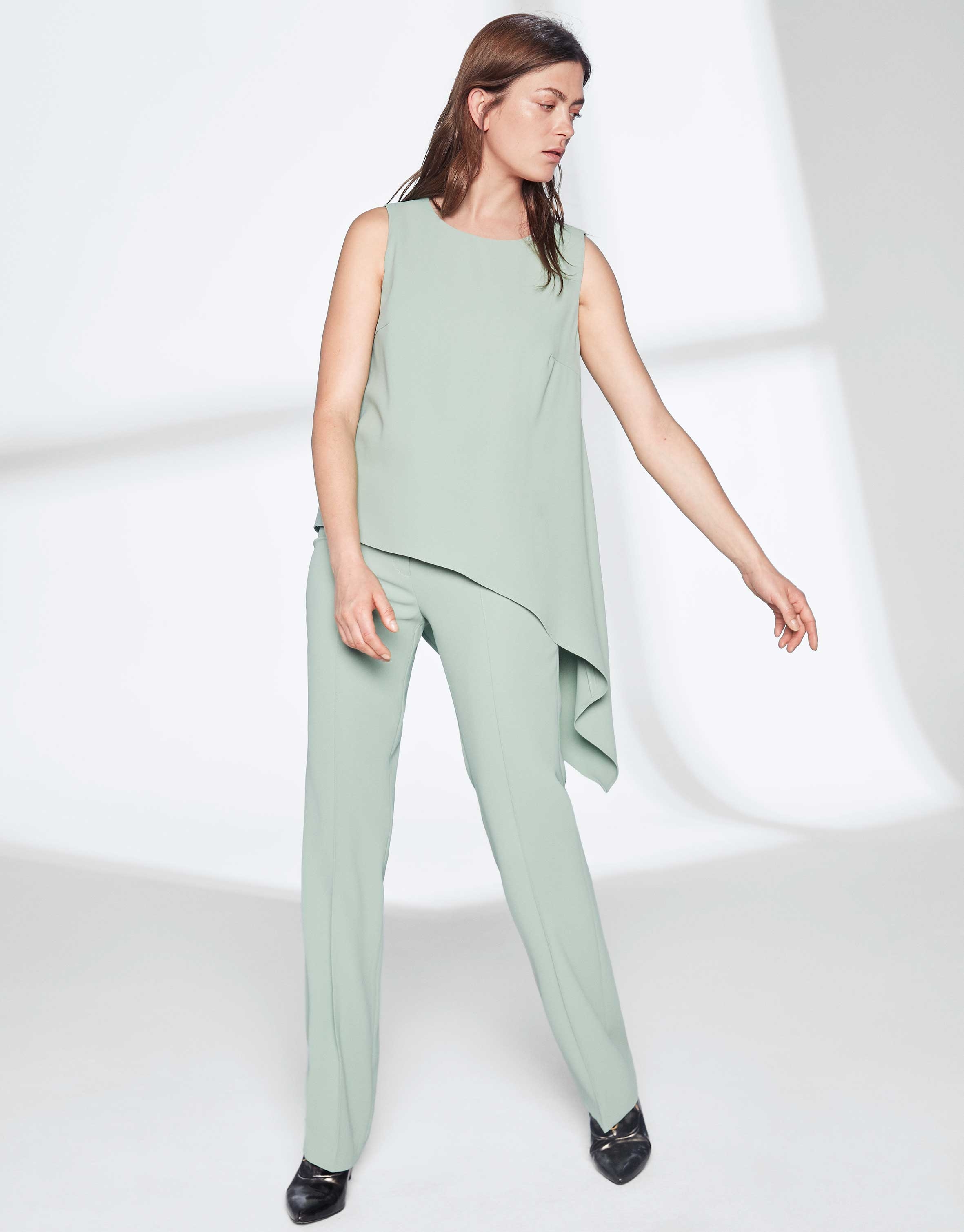 Pastel green top with asymmetric hem Woman Roberto Verino