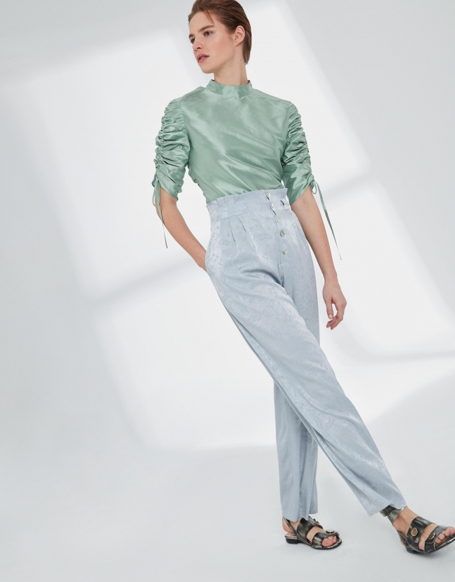 Pastel green silk blouse with puckered sleeves
