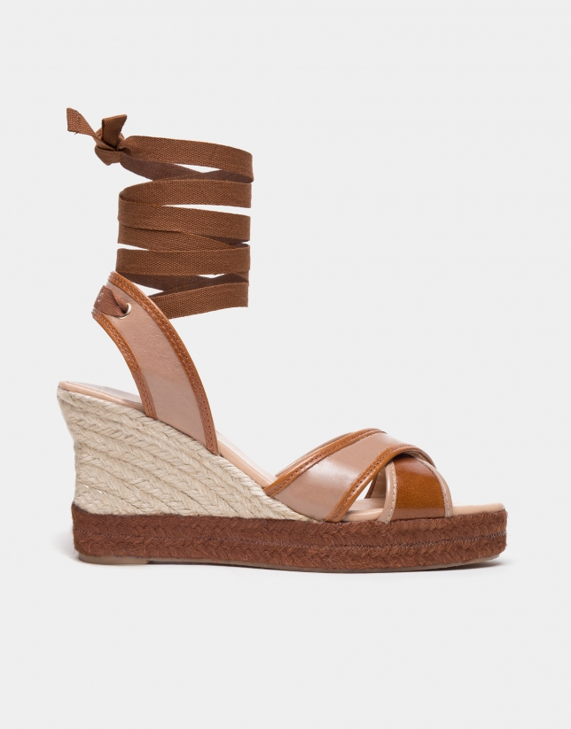 Beige crossover wedge shoes