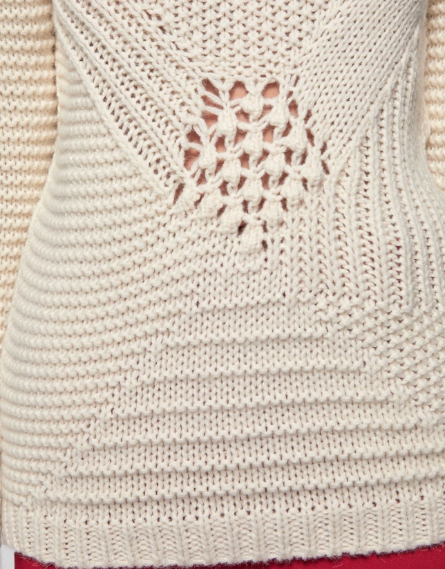 Beige knit sweater with openwork and knotted design
