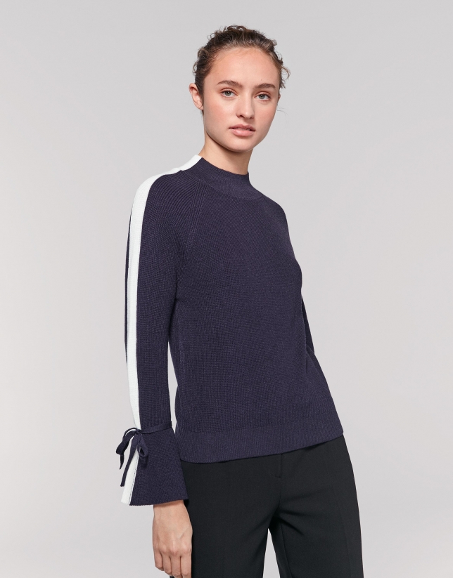 Navy blue sweater with bell-shaped sleeves
