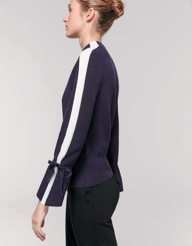 Navy blue sweater with bell-shaped sleeves