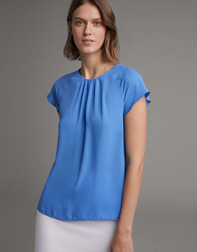 Blue blouse with short raglan sleeves