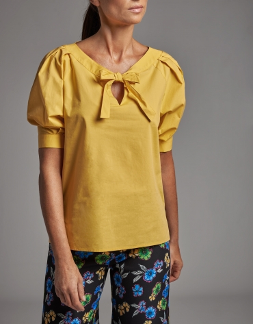 Yellow shirt with boat neck and bow