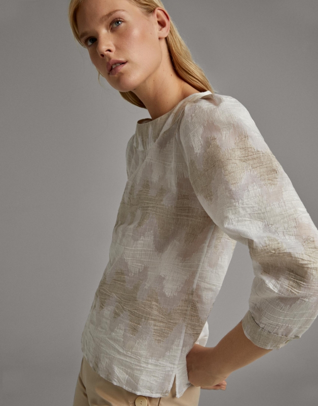 Beige shirt with boat neck and puffed sleeves