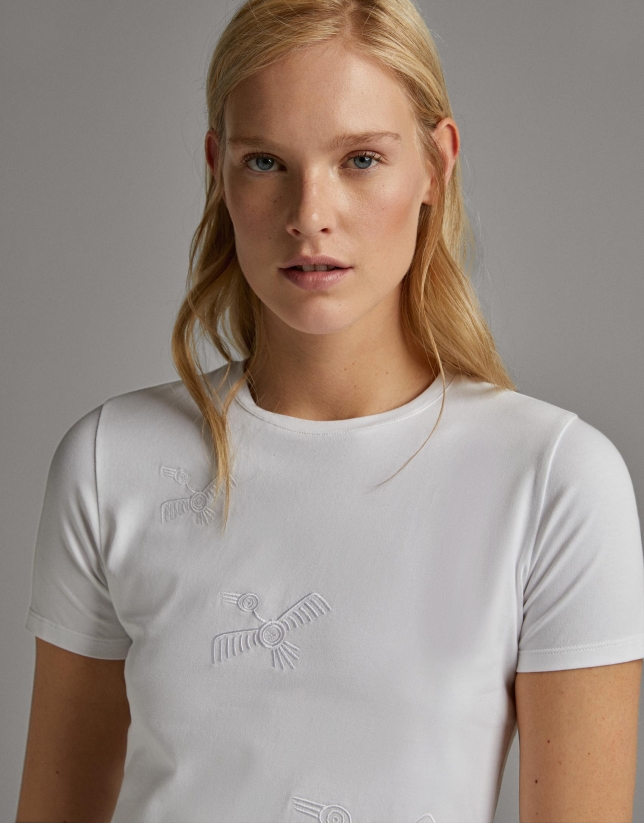White top with embroidered birds
