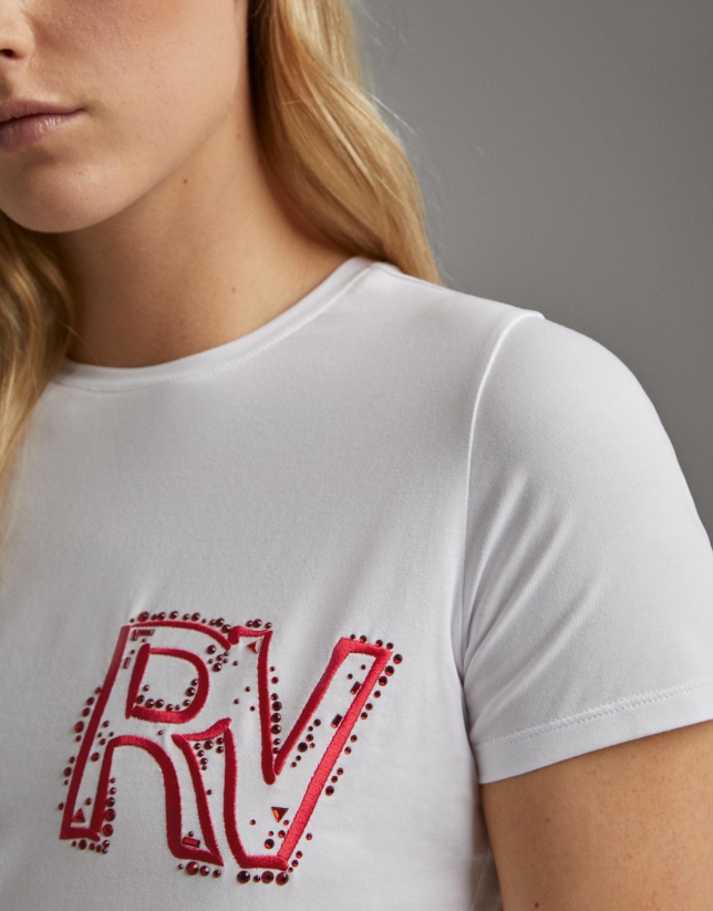 White shirt with embroidered pink RV logo