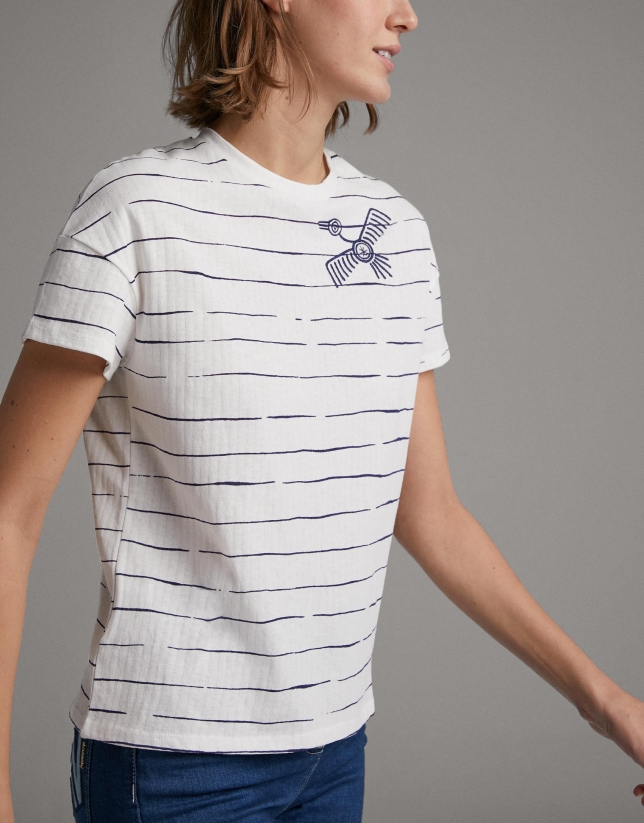 Blue striped top with embroidered bird