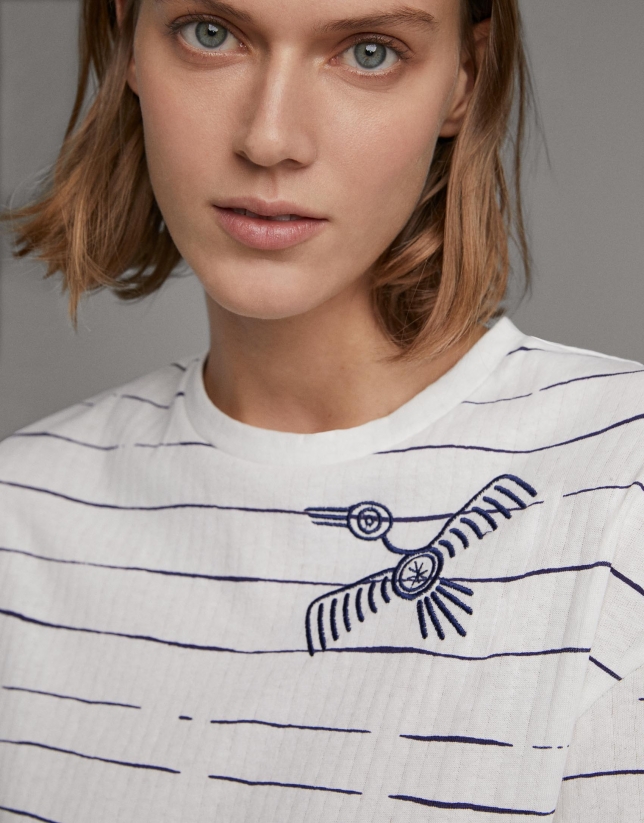 Blue striped top with embroidered bird
