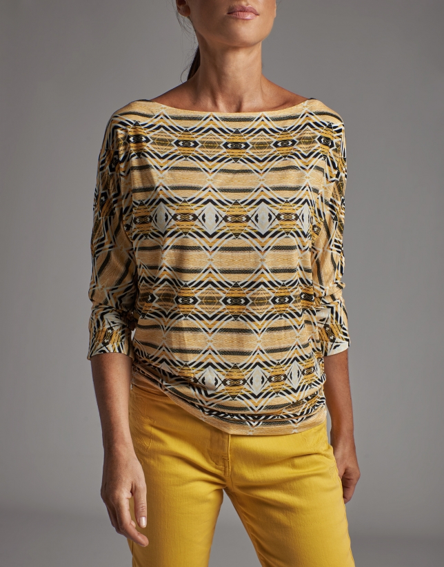 Gold print top with bat sleeves 